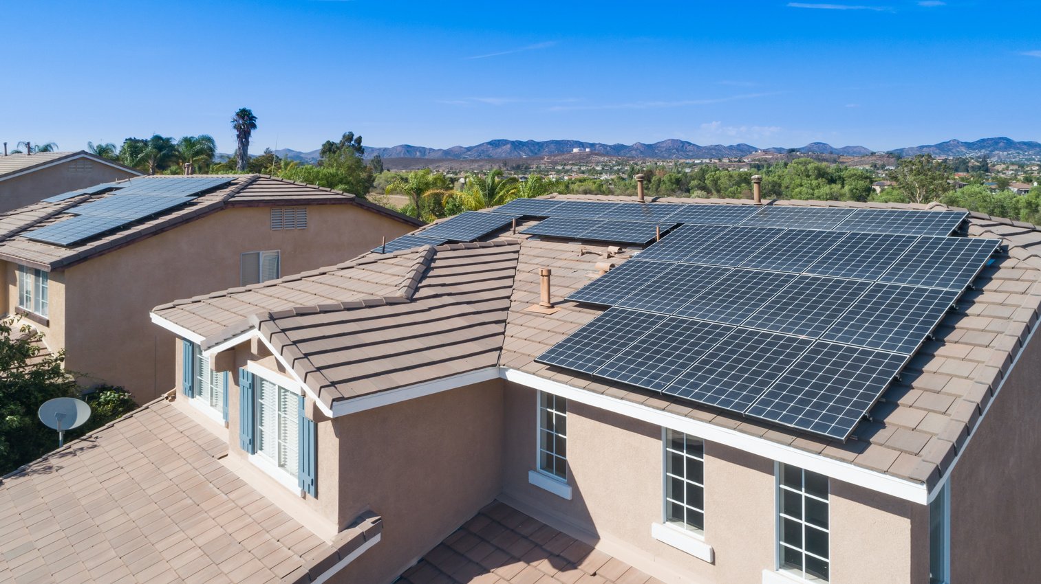 Solar Panels Installed on Roof of Large House